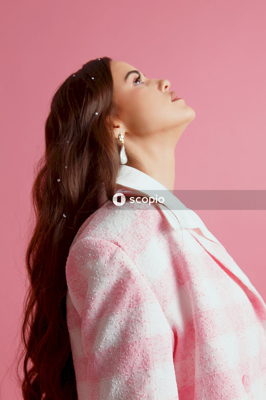 Woman in pink and white polka dot robe