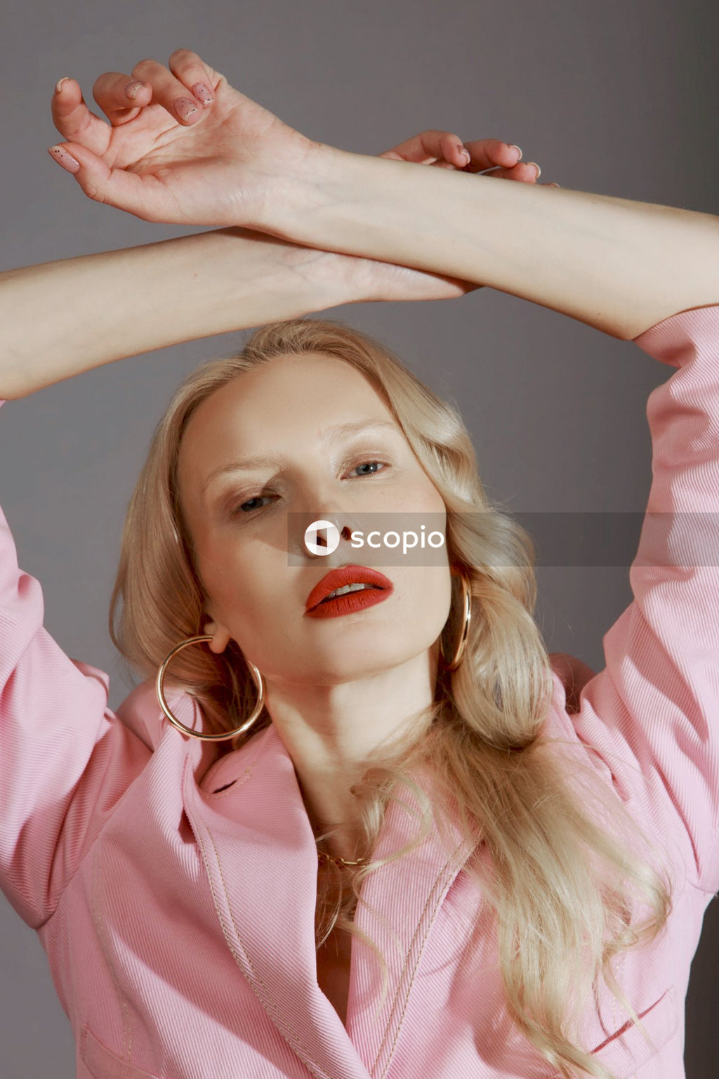 Woman in pink button up shirt