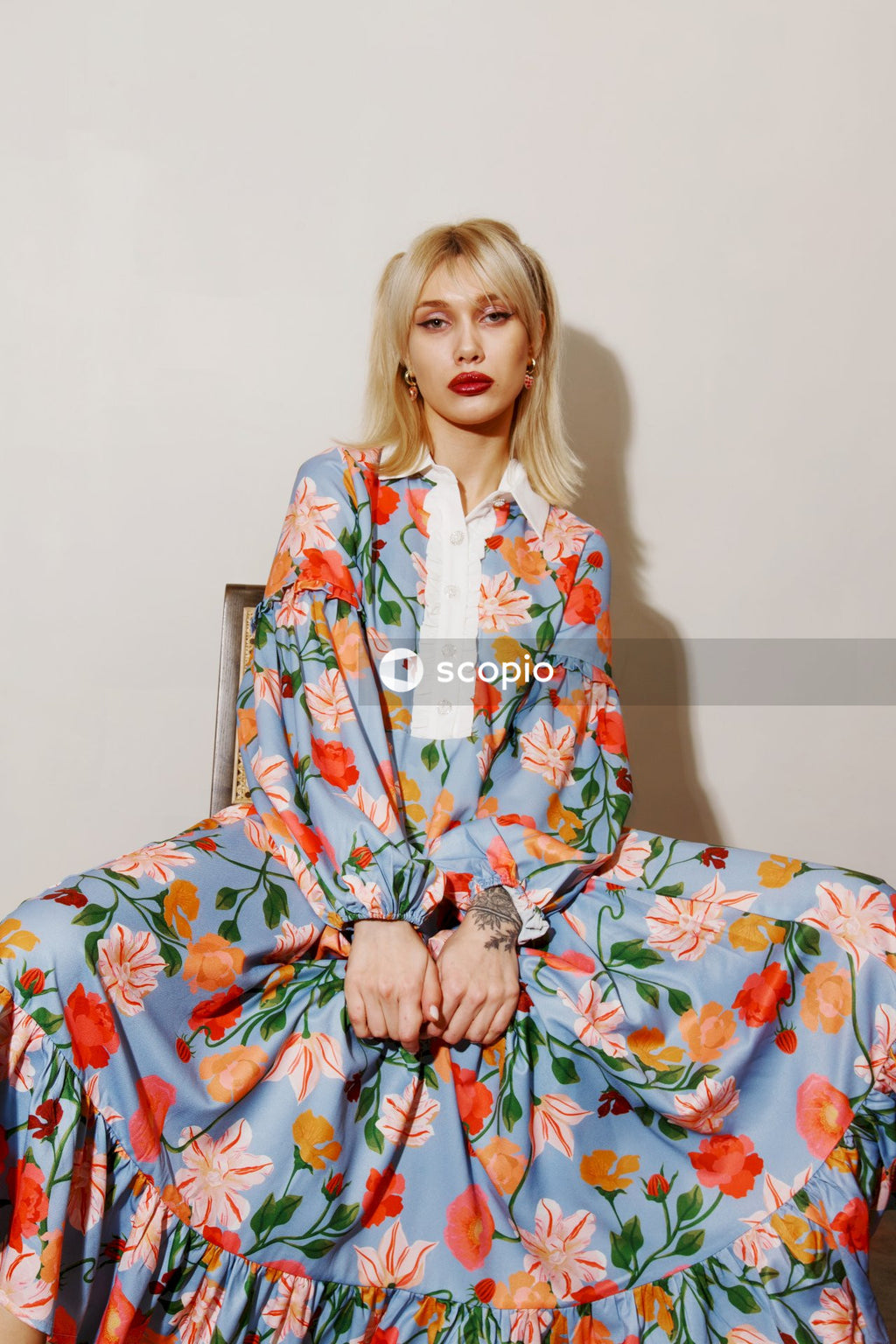 Woman in pink green and blue floral robe