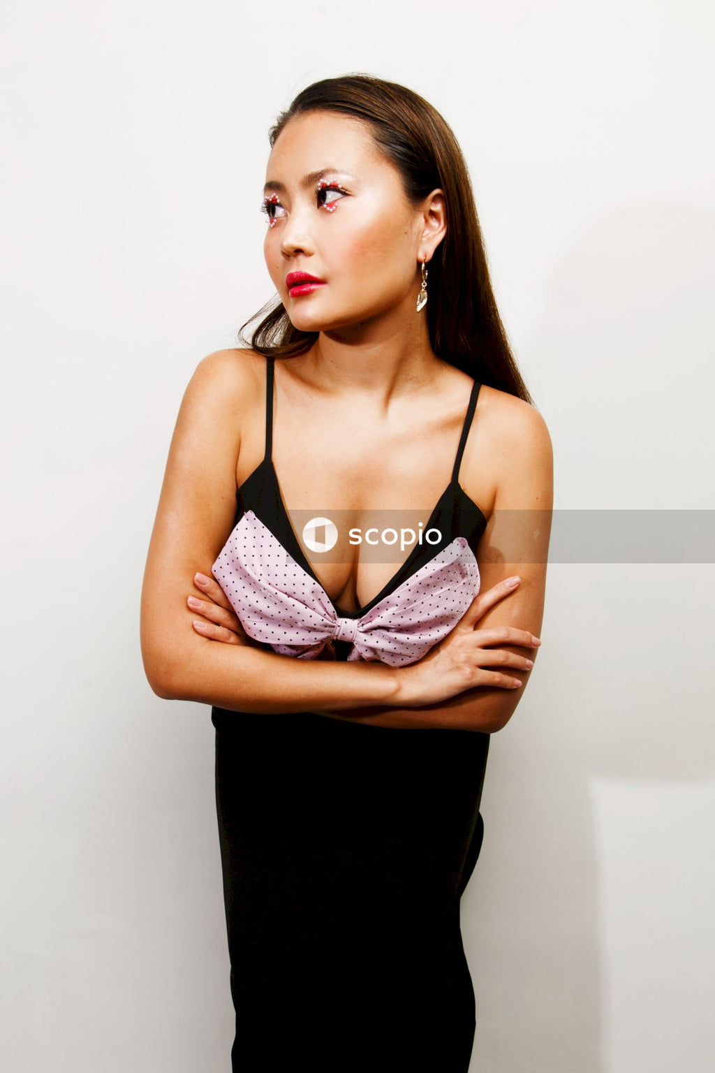 Woman in purple and black brassiere