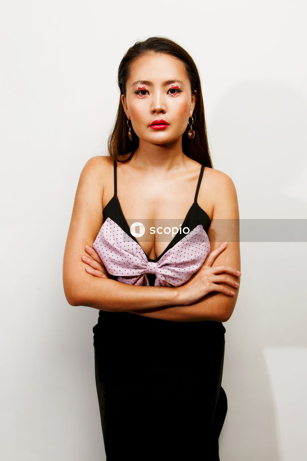 Woman in purple and black brassiere