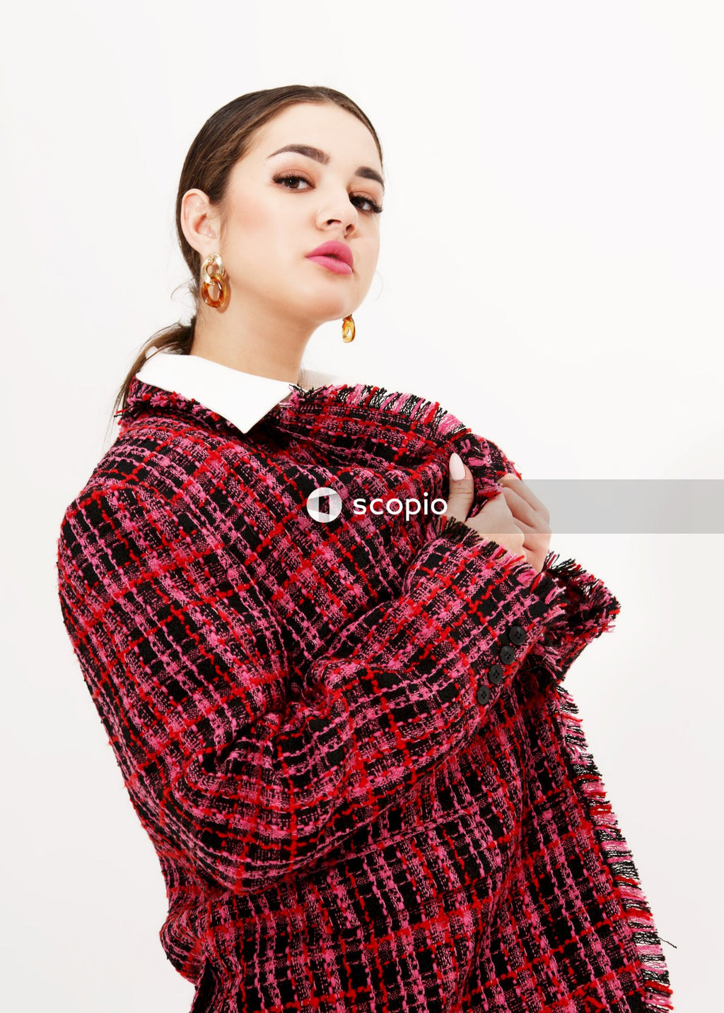 Woman in red and black plaid dress shirt