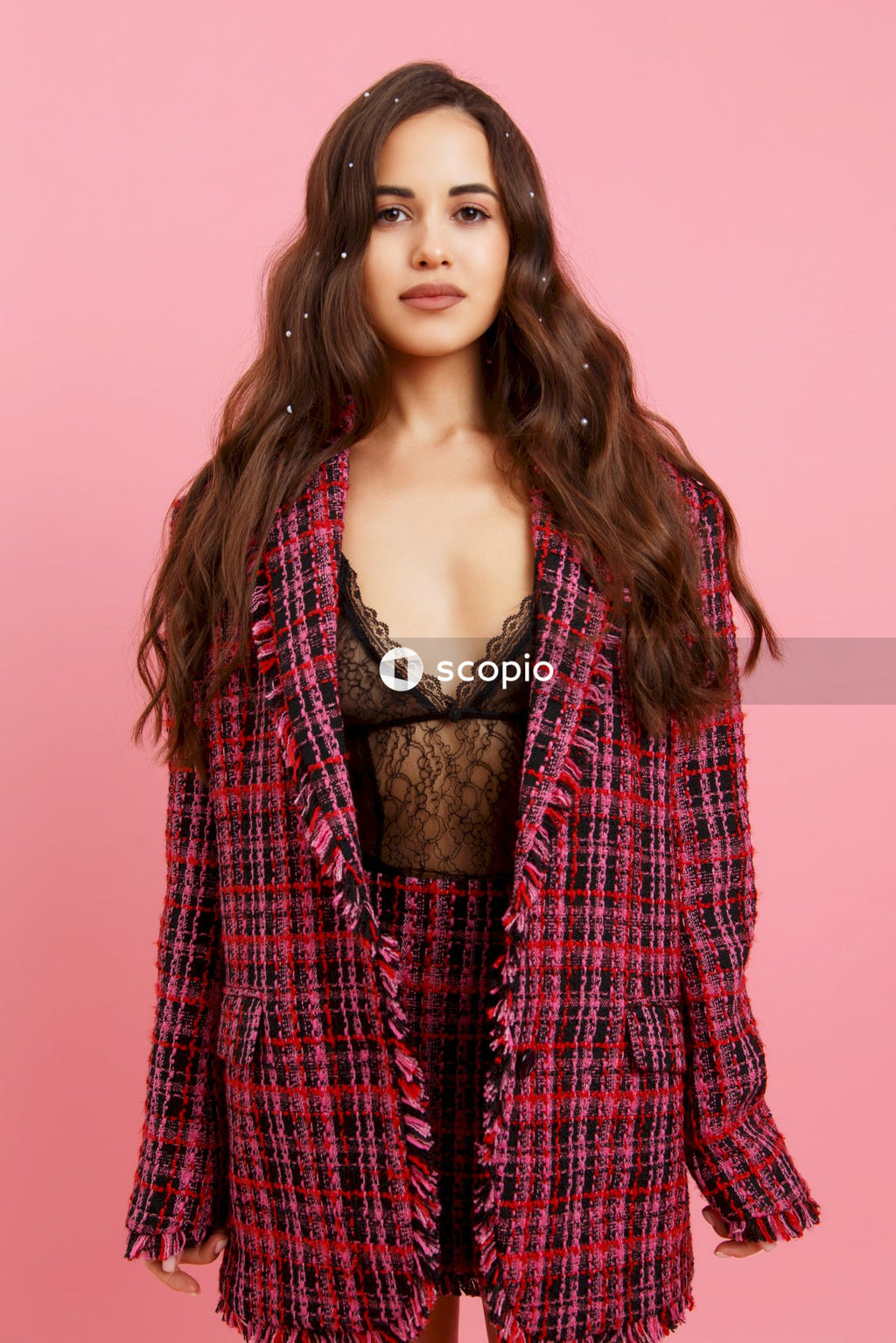 Woman in red and black plaid dress shirt