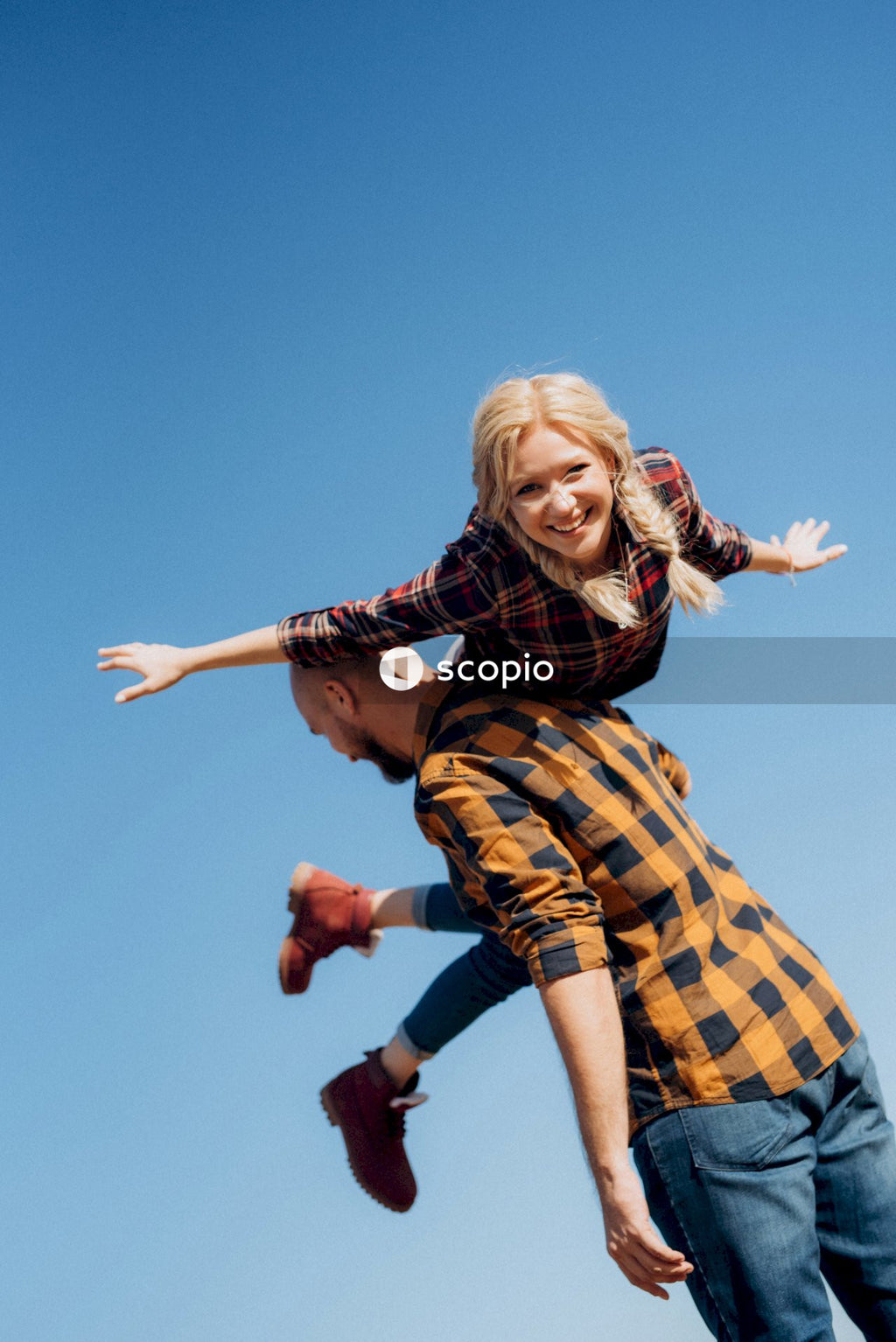 Man holding woman