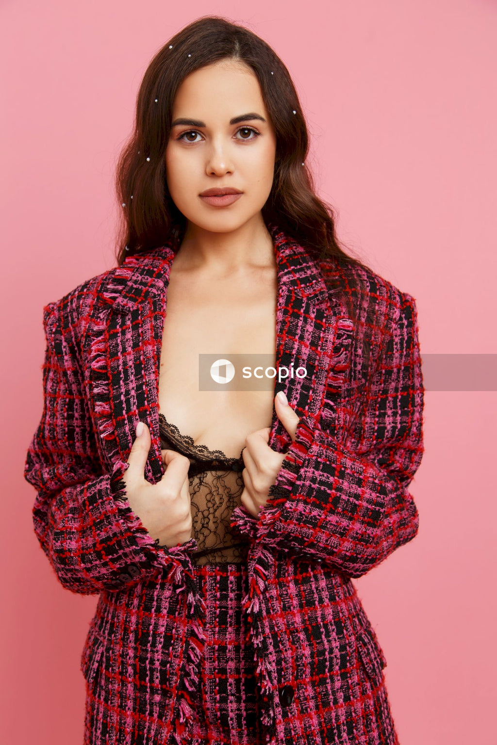 Woman in red and black plaid long sleeve shirt