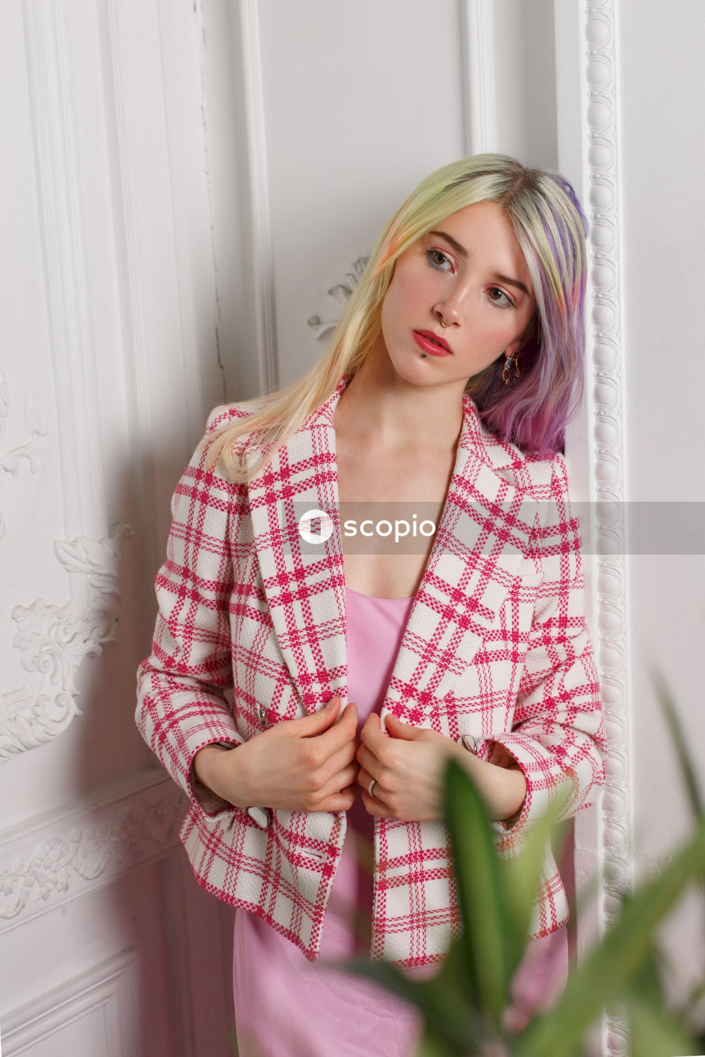 Woman in red and white plaid dress shirt