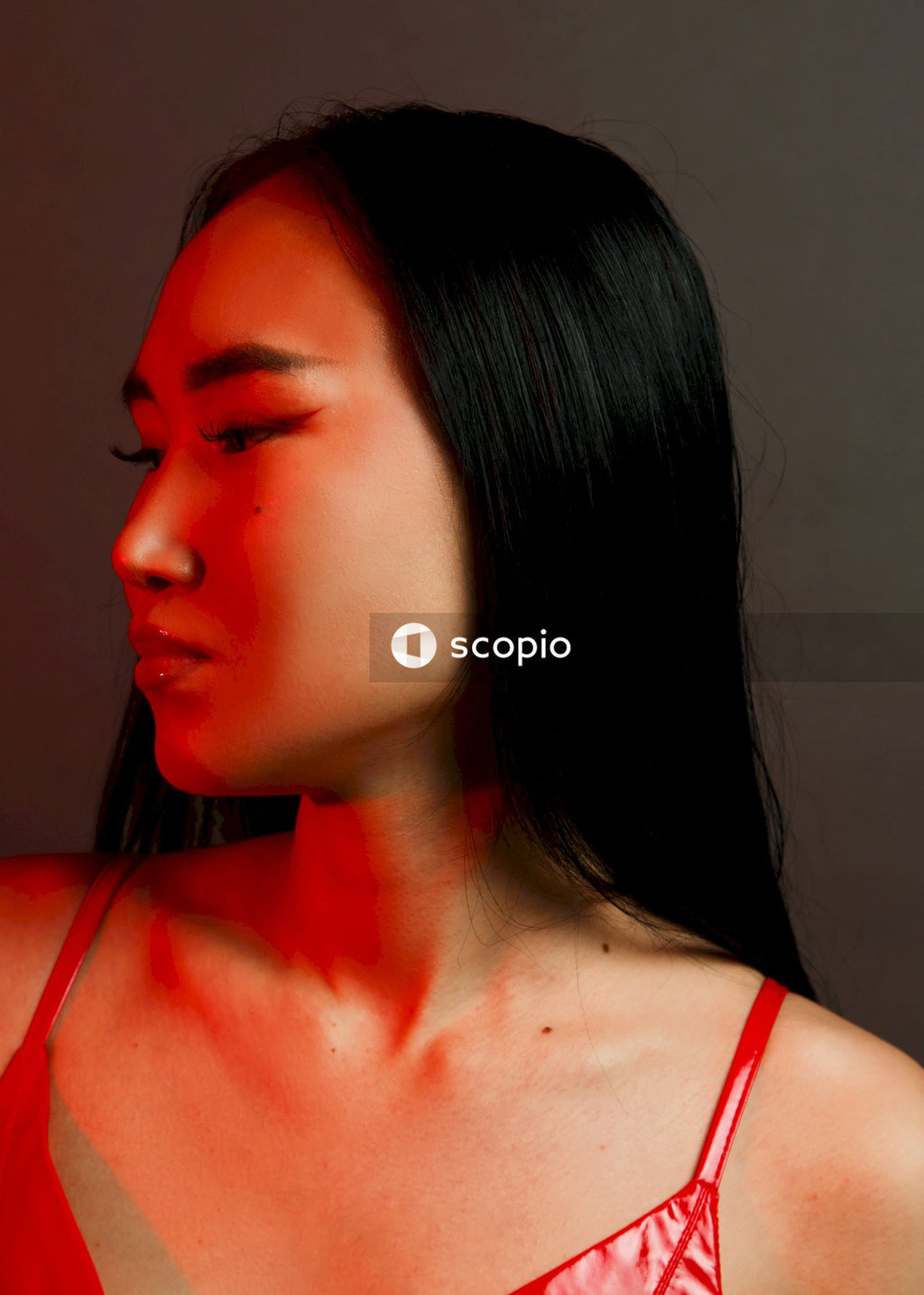 Woman in red and white tank top