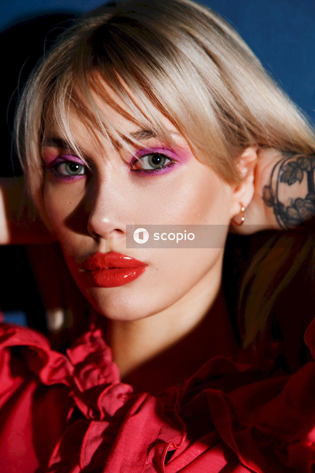 Woman in red lipstick and red lipstick
