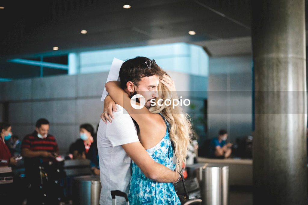 Woman in white and blue floral dress