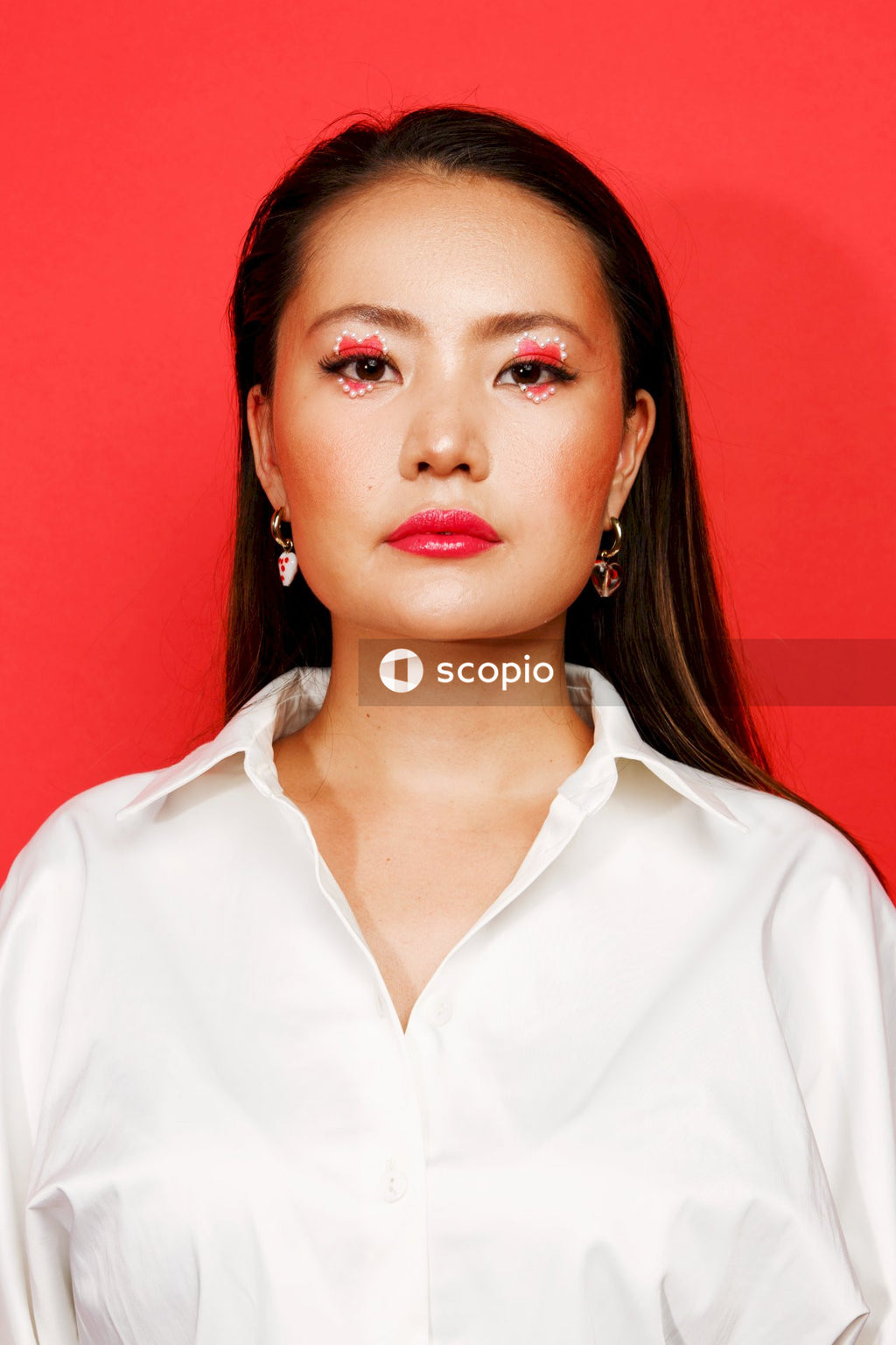 Woman in white button up shirt