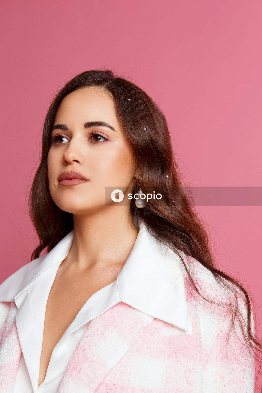 Woman in white collared shirt