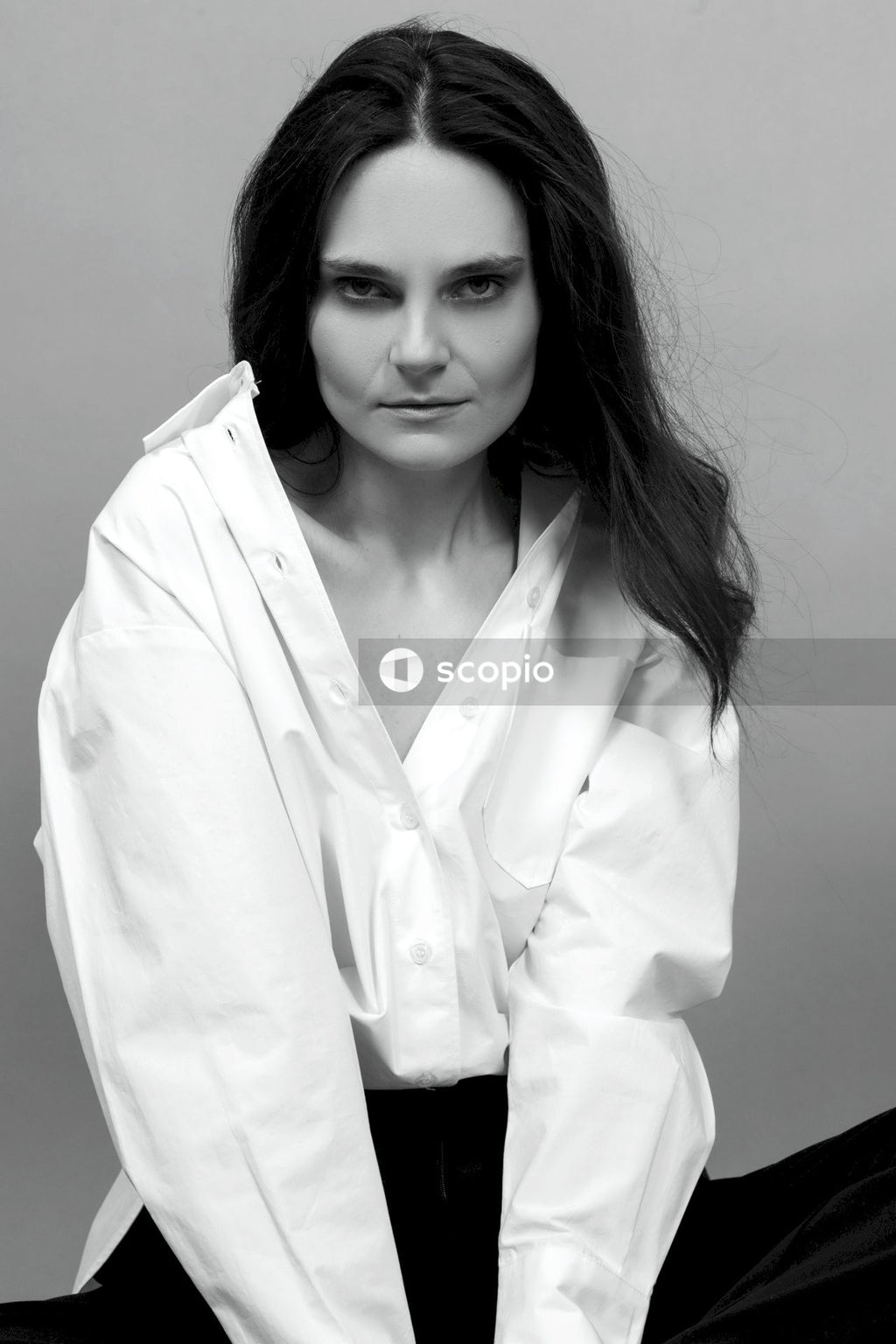 Woman in white dress shirt