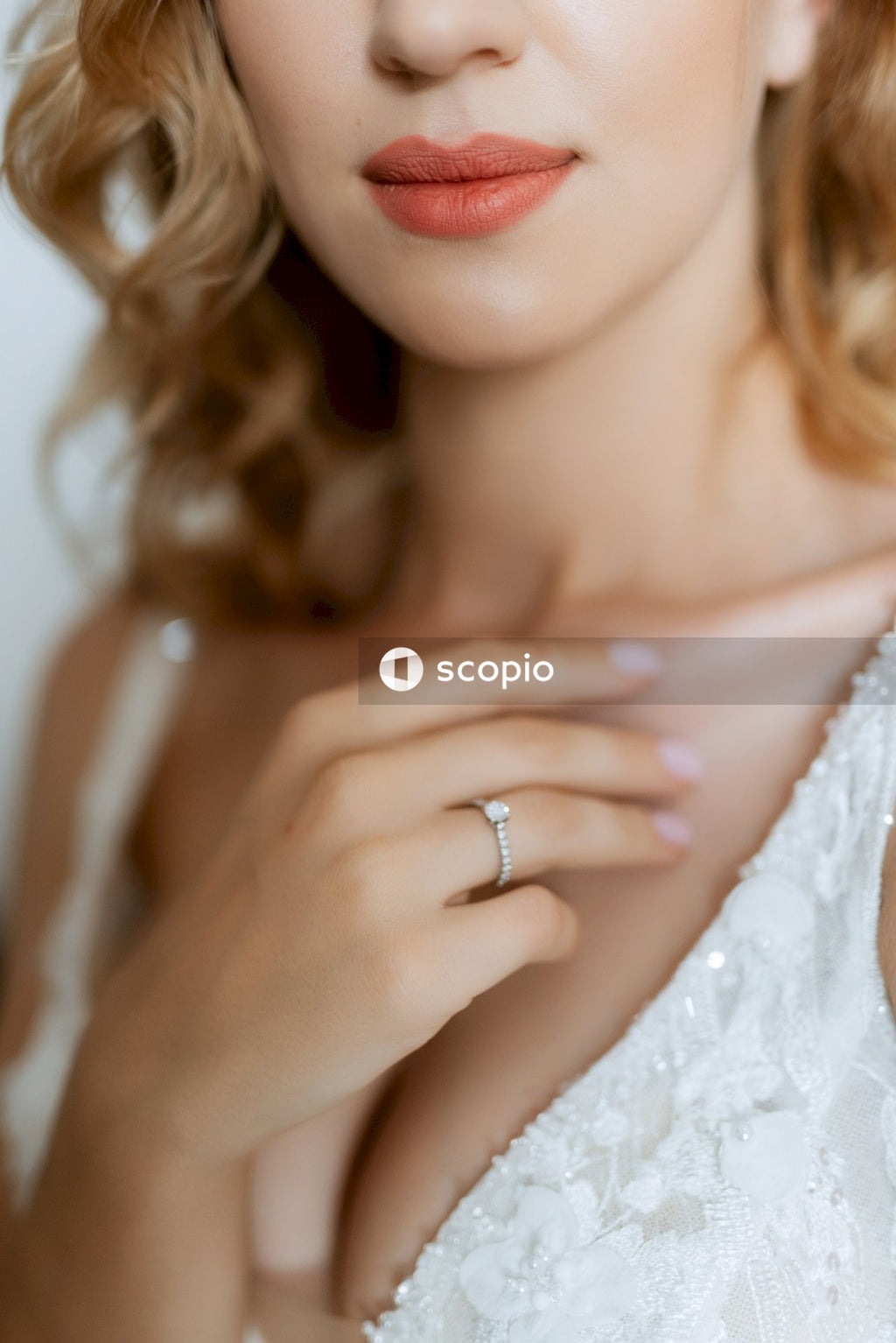 Woman in white floral lace spaghetti strap top