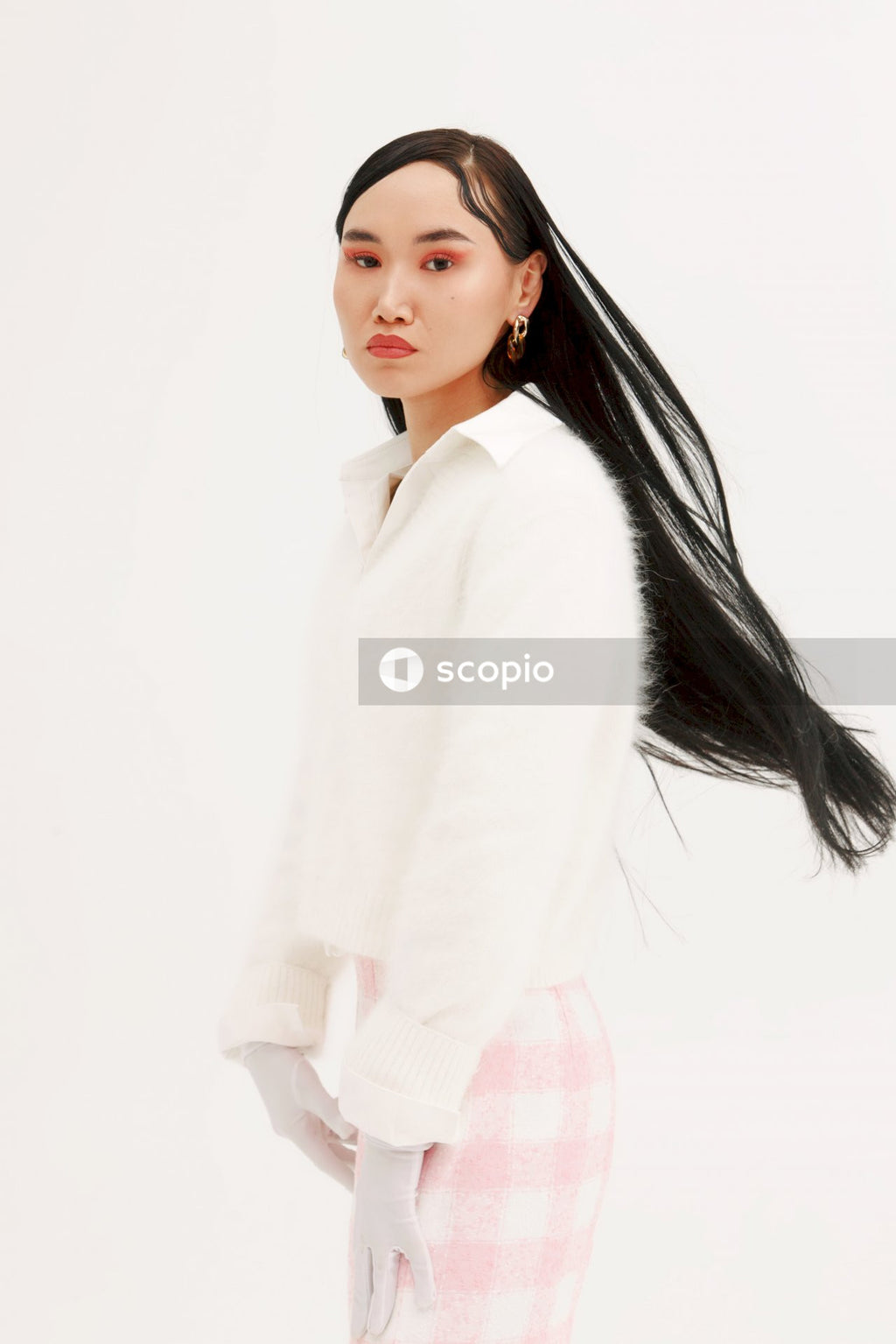 Woman in white long sleeve shirt