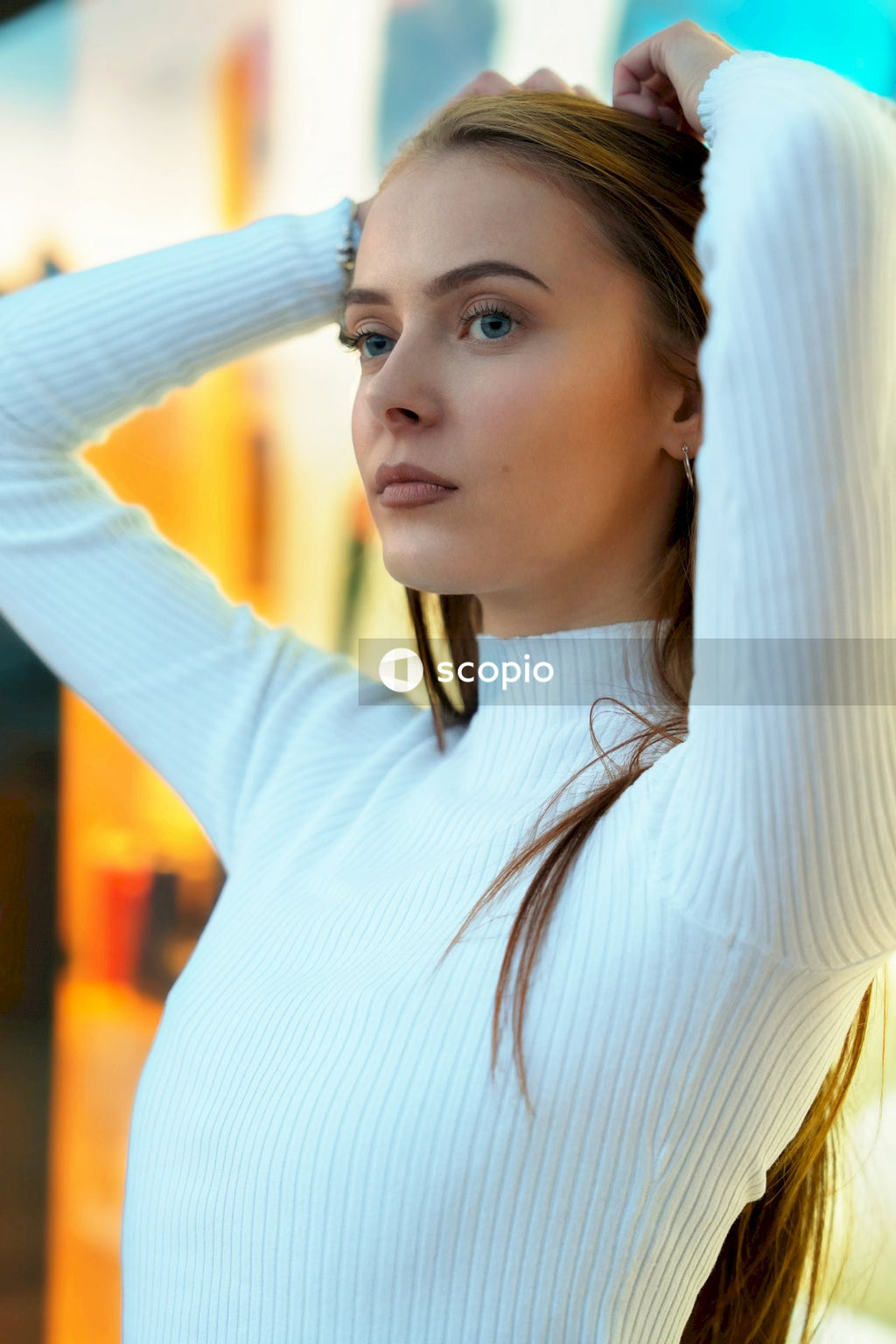 Woman in white long sleeve shirt