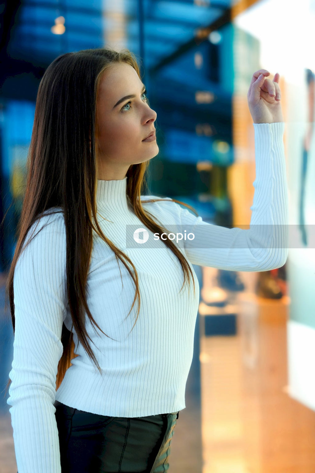 Woman in white long sleeve shirt