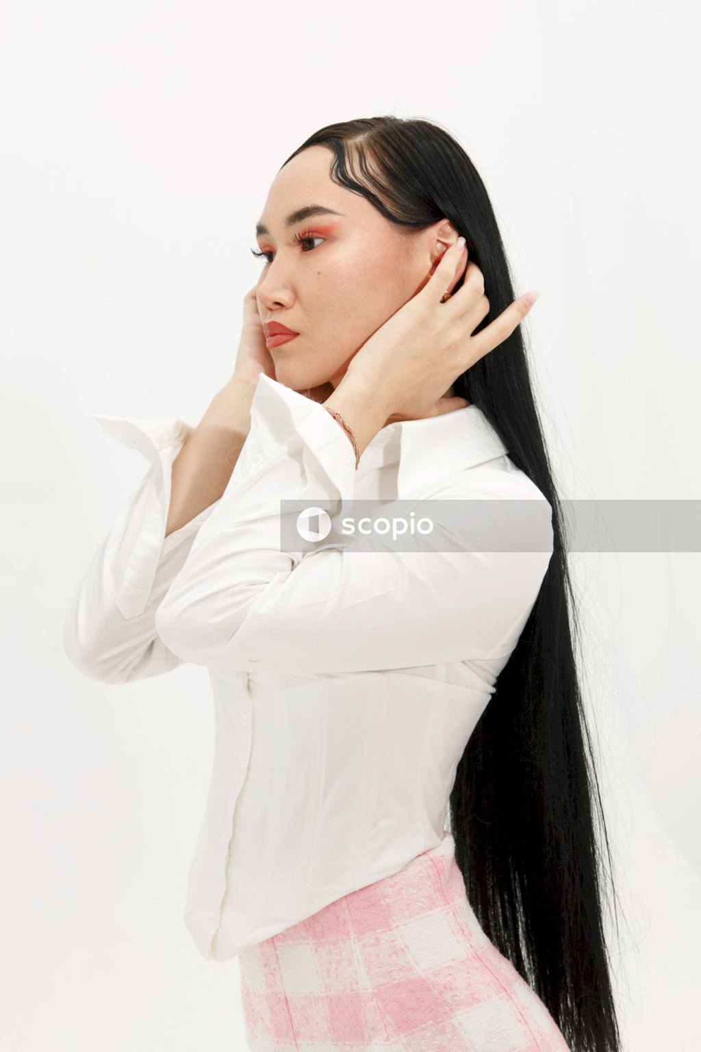 Woman in white long sleeve shirt