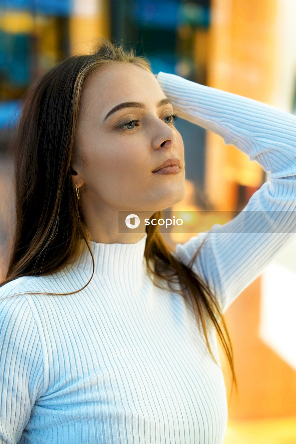 Woman in white long sleeve shirt