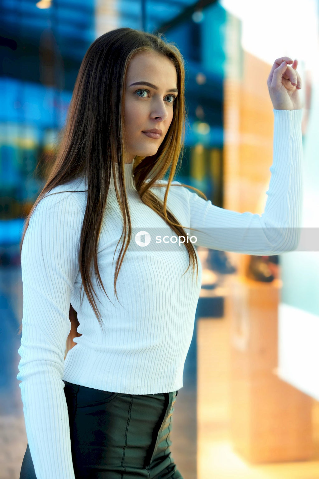 Woman in white long sleeve shirt