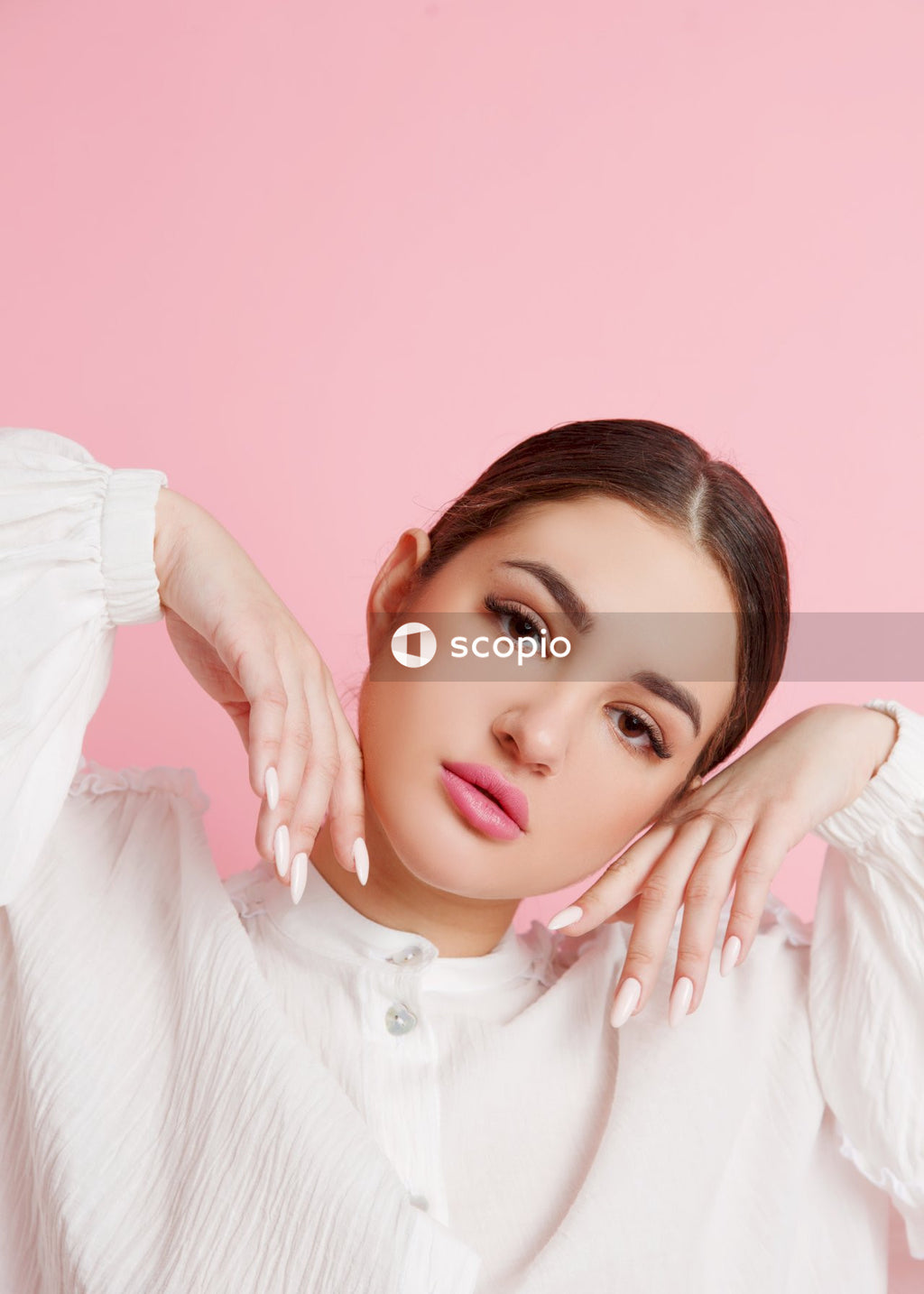 Woman in white long sleeve shirt