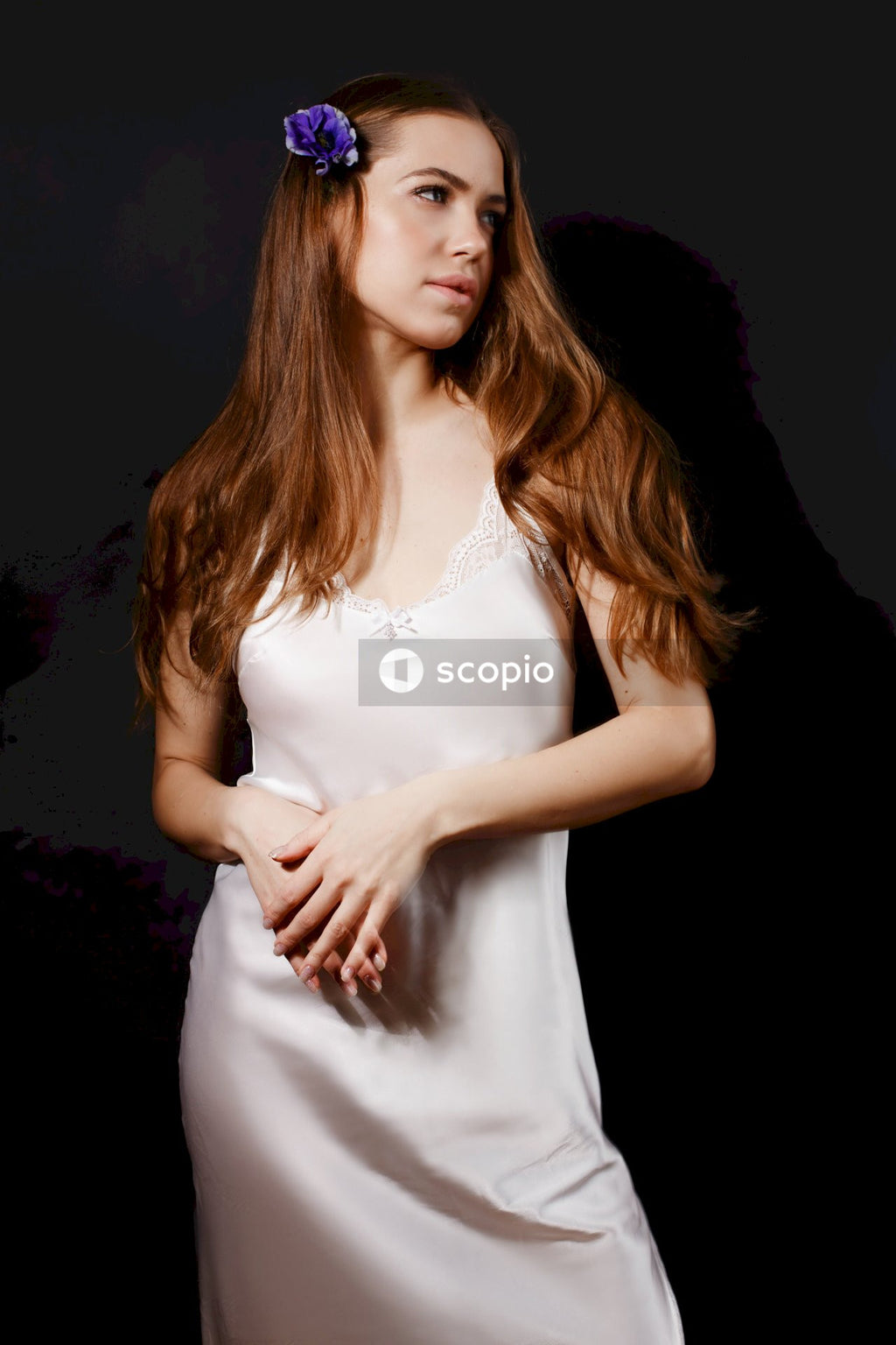 Woman in white sleeveless dress