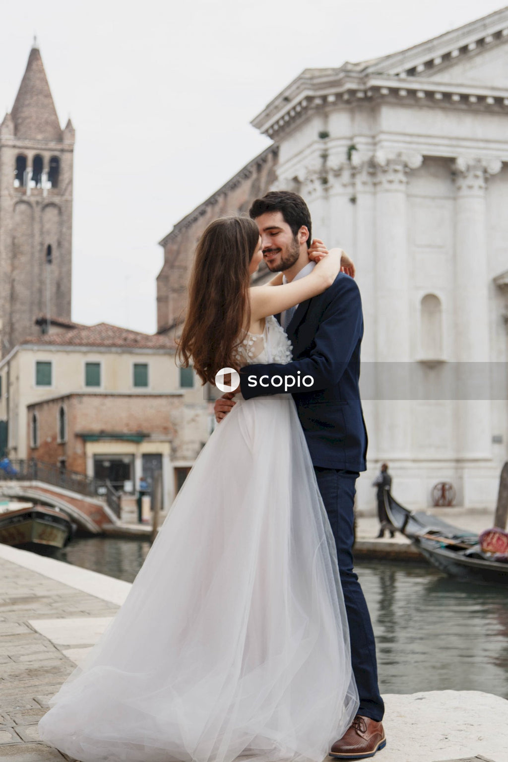 Bride and groom kissing outdoor