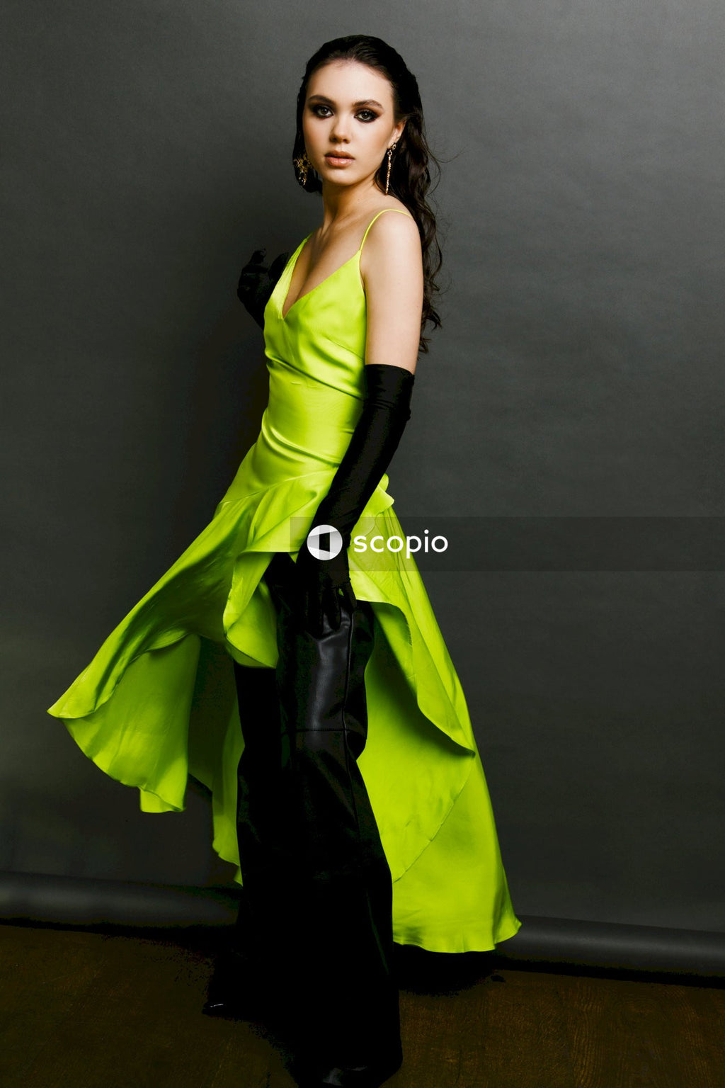 Woman in yellow and black dress