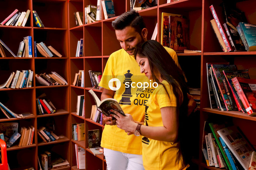 Woman in yellow crew neck t-shirt hugging man in white t-shirt