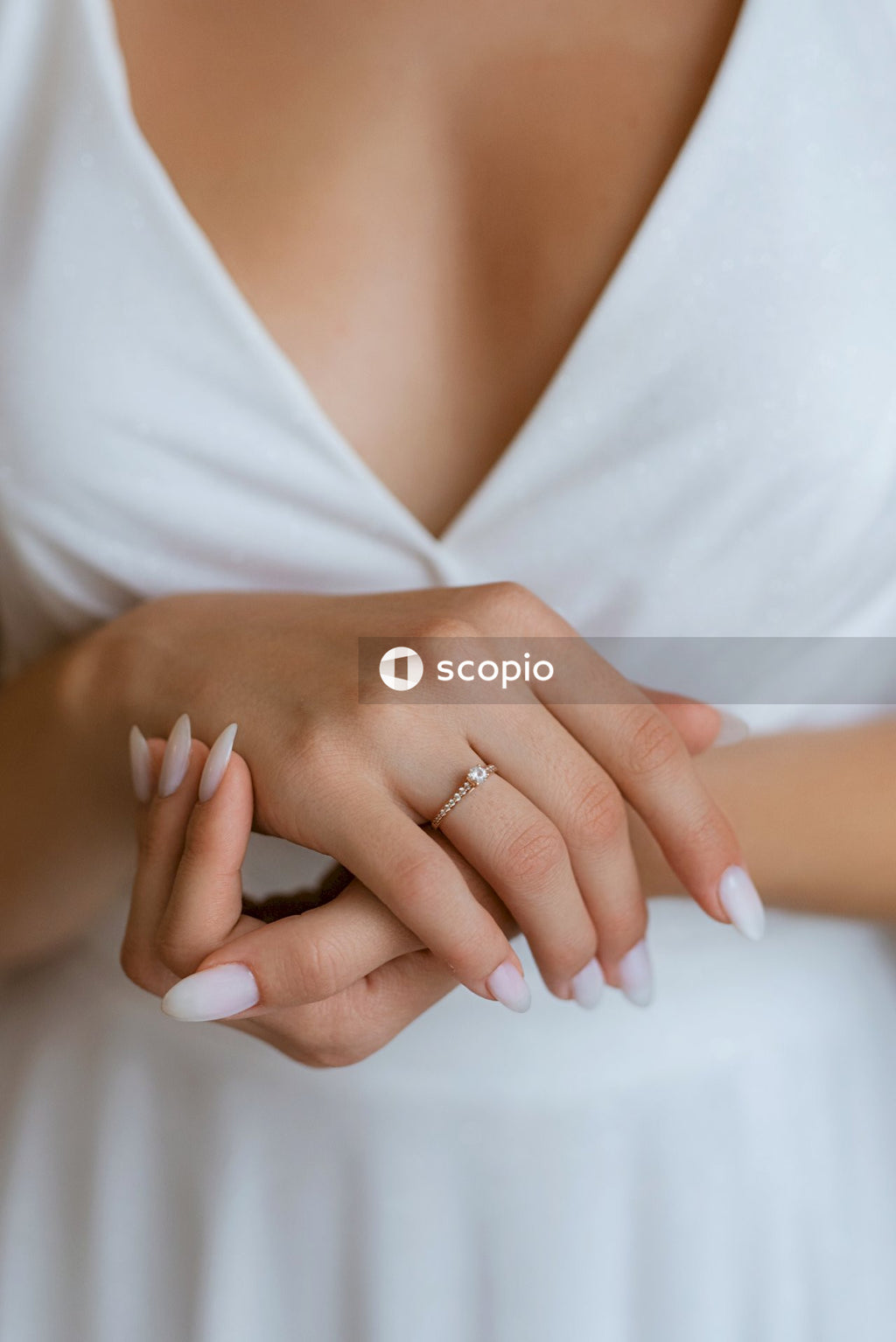 Woman wearing silver diamond ring