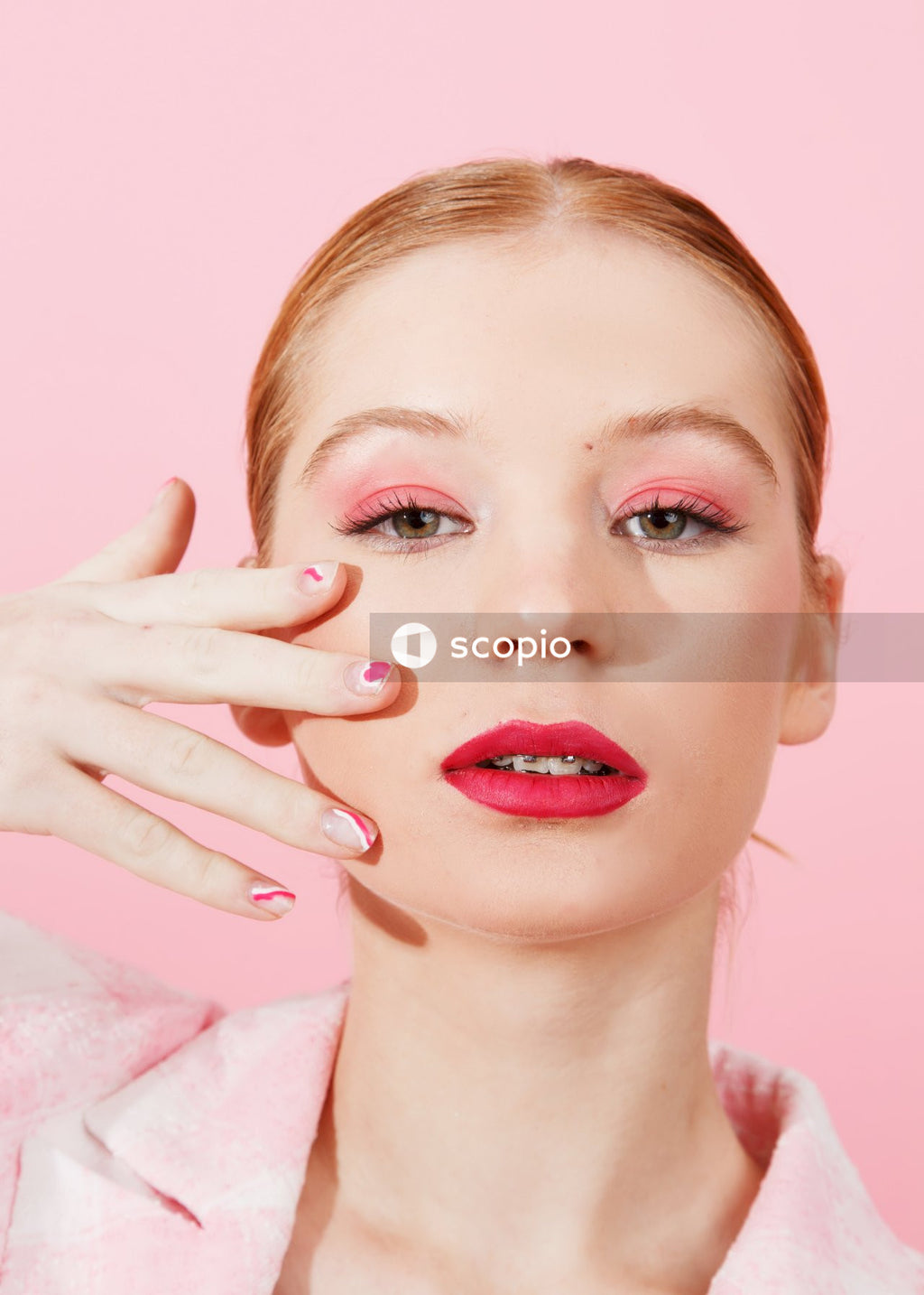 Woman with red lipstick and pink lipstick