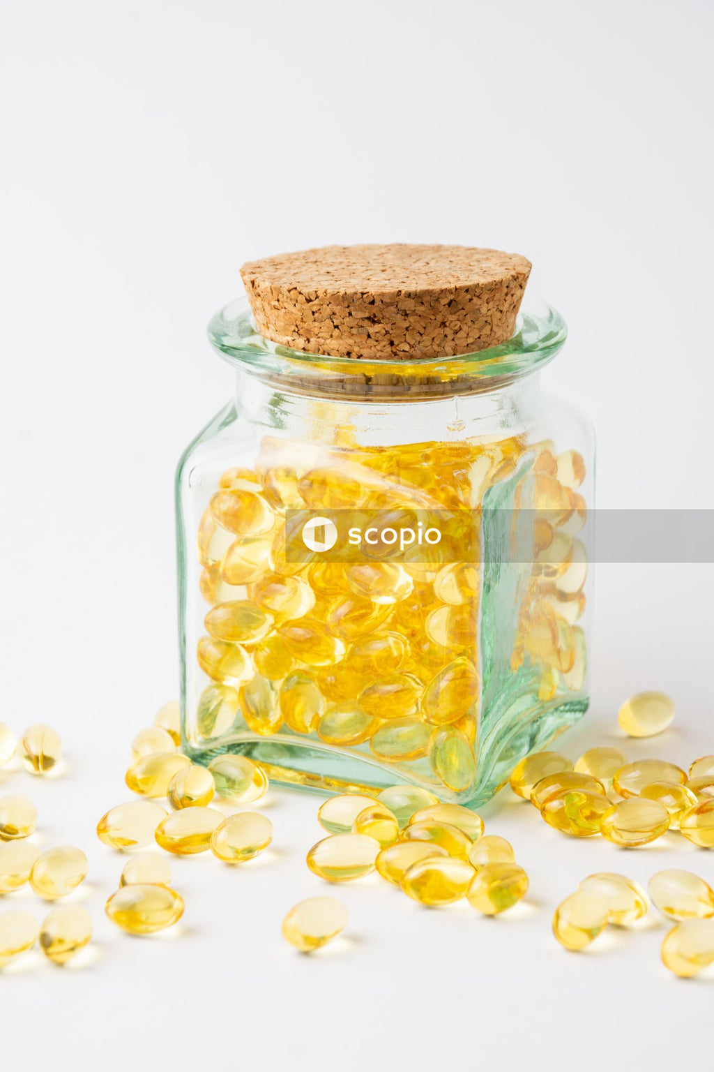 Yellow and white beans in clear glass jar