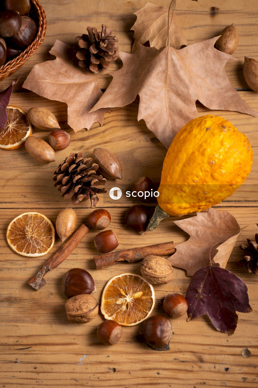 Yellow lemon beside brown and white nuts