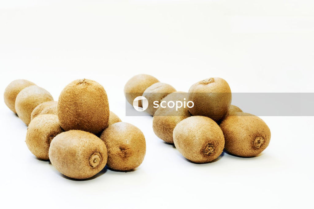 Yellow potatoes on white surface