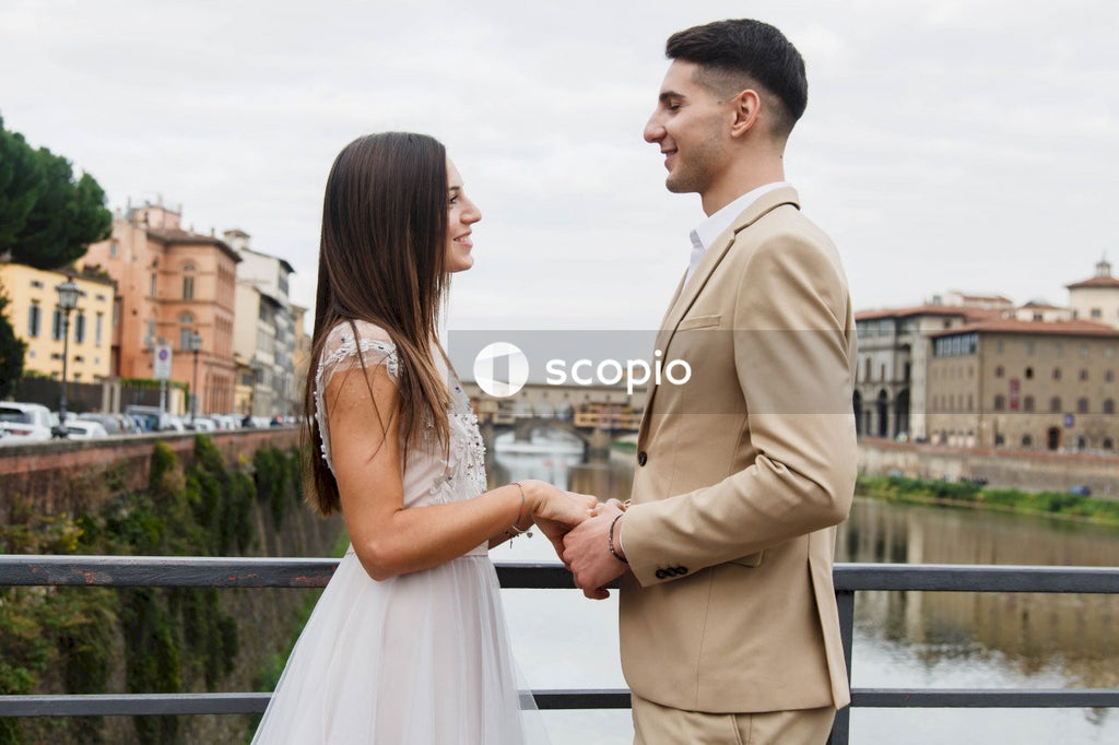 Young couple posing together on the streets in the city