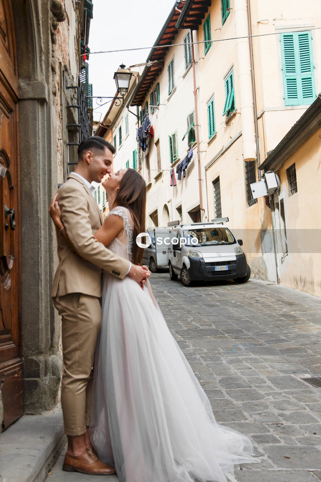 Young couple posing together on the streets in the city