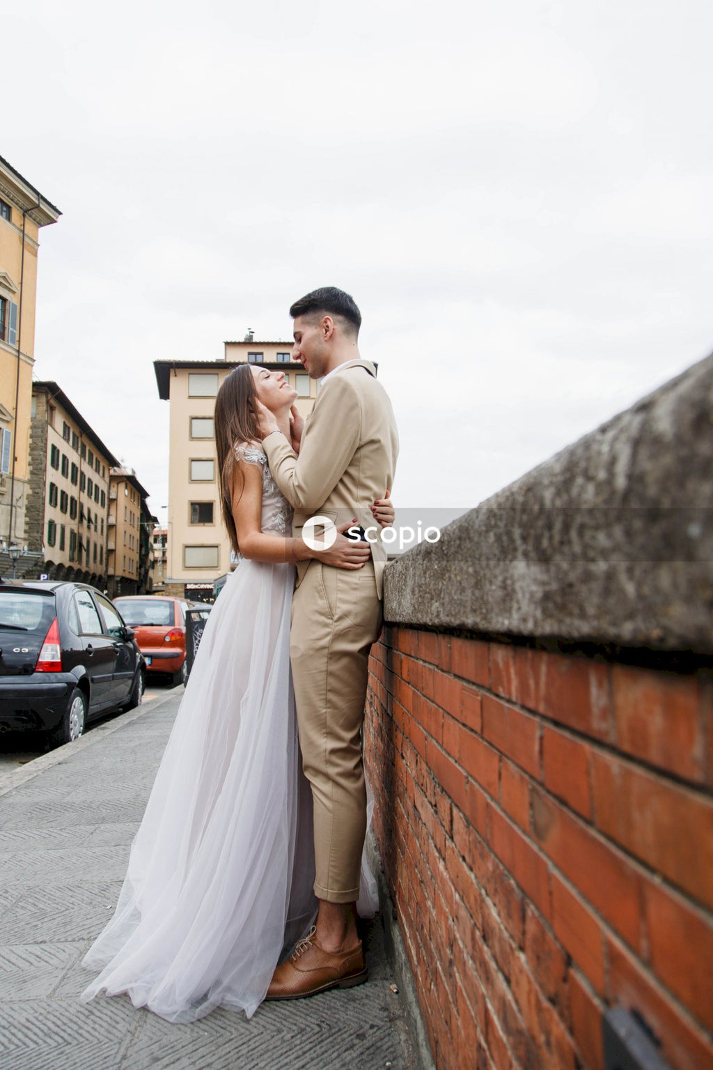Young couple posing together on the streets in the city