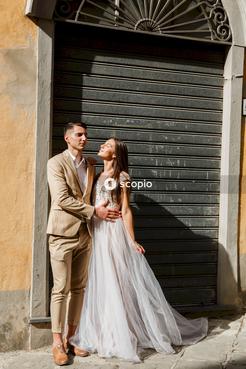 Young couple posing together on the streets in the city