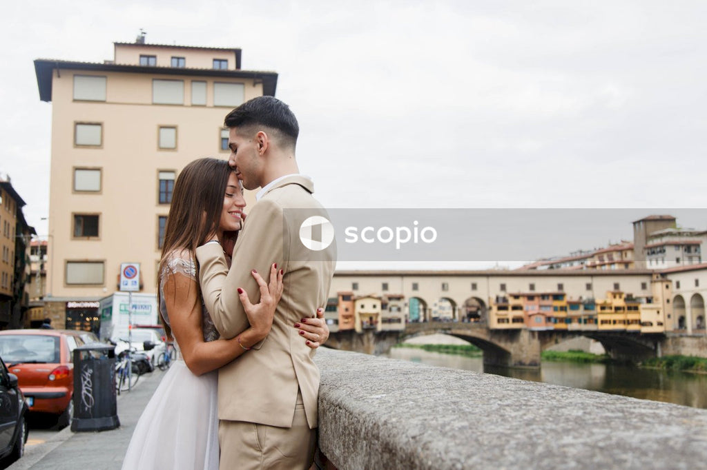 Young couple posing together on the streets in the city