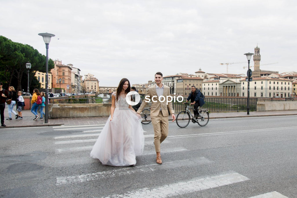 Young couple posing together on the streets in the city