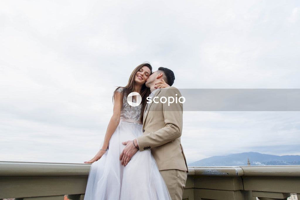 Young couple posing together on the streets in the city