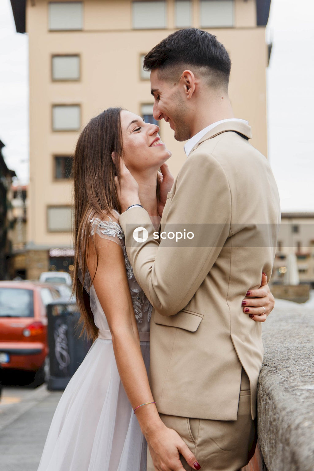 Young couple posing together on the streets in the city
