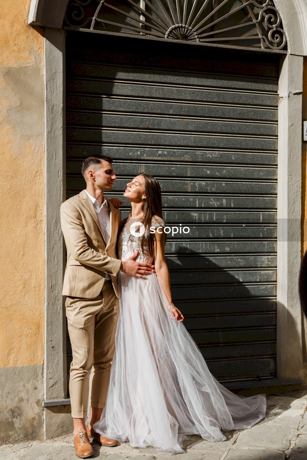 Young couple posing together on the streets in the city
