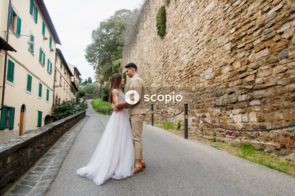 Young couple posing together on the streets in the city