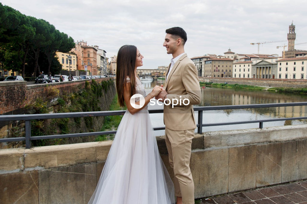 Young couple posing together on the streets in the city