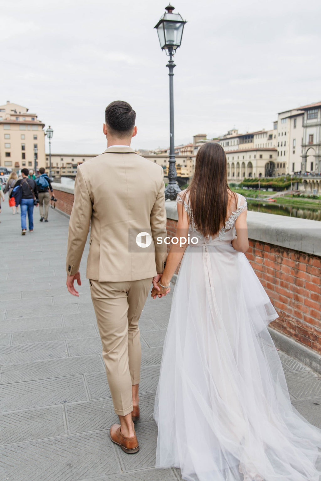 Young couple posing together on the streets in the city