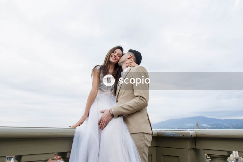 Young couple posing together on the streets in the city