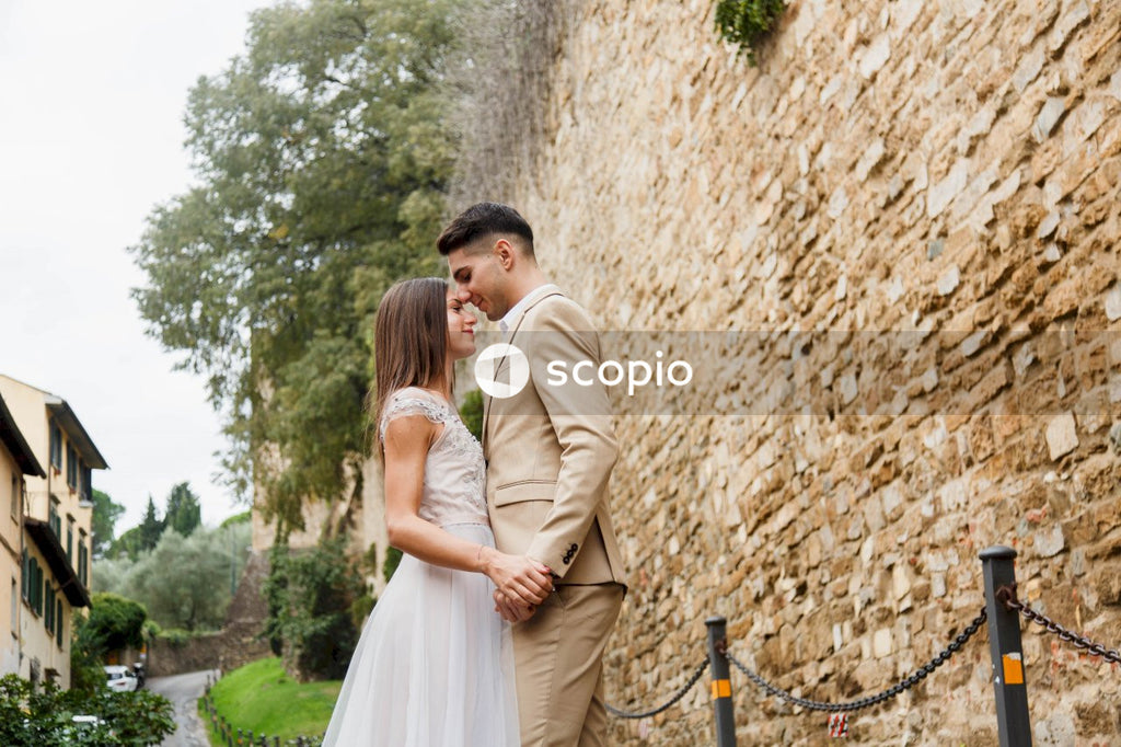 Young couple posing together on the streets in the city