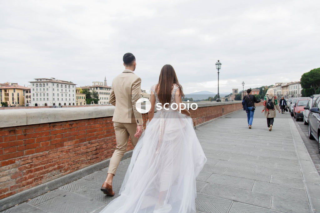 Young couple posing together on the streets in the city